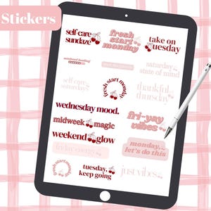 May include: A digital tablet displays various digital stickers with phrases like "fresh start monday" and "fri-yay vibes." The stickers are in shades of pink and red, with cherry illustrations. The tablet is on a pink and white plaid background.