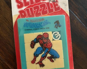 Raro puzzle scorrevole di Amazing Spider-Man nella confezione originale. 1978, American Publishing.