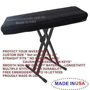 May include: Black keyboard cover with the text "customcovers4u com llc Made in USA" and "PROTECT YOUR INVESTMENT CUSTOM SIZE "Not one size fits all" STRAIGHT FITS "NO RUBBER BAND/ CAUSING PRESSURE ON KEYS" SMOOTH NON-RIP QUALITY MATERIAL-LONGETIVITY MULTIPLE STITCHES FOR DURABILITY FREE EMBROIDERY UP TO 10 LETTERS PROUDLY MADE IN USA MADE INUSA".