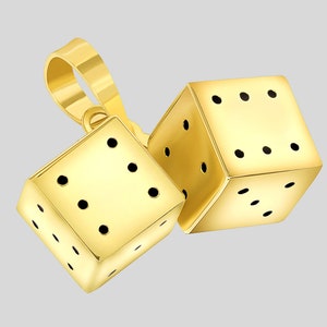 May include: A gold-tone dice pendant necklace with two dice charms. The dice are detailed with black dots.