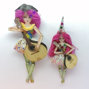 Colombian, Pierrot or Harlequin  doll is articulated like a paper puppet. Doll with a guitar, art doll that can be a jewelry