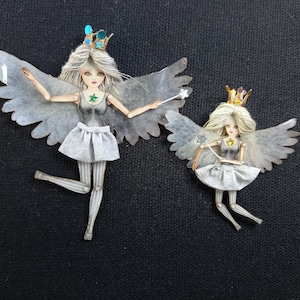 Angel doll is articulated-a paper puppet. Fairy/Butterfly doll, art doll that is a jewelry.