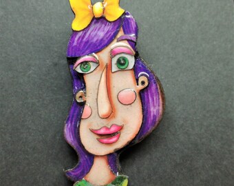 Colorful brooch with a funny face, sweet girl with purple hair. Inspired by Picasso. Art to use. Laser cut wood. Crazy and cheerful jewelry