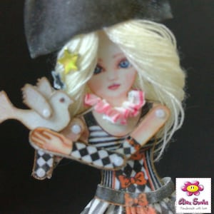 Colombian, Pierrot or Harlequin  doll is articulated like a paper puppet. Doll with a dove, art doll that can be a jewelry