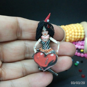 Tiny Colombian, Pierrot or Harlequindoll is articulated like a paper puppet. Doll with heart, art doll that can be a jewelry