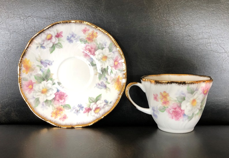 Queens Rosina Cup and Saucer Heavy Gold Bluebells White Apple Blossom and Roses Forget Me Nots