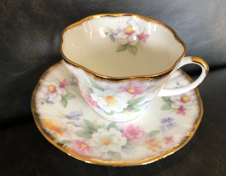 Queens Rosina Cup and Saucer Heavy Gold Bluebells White Apple Blossom and Roses Forget Me Nots
