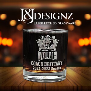 Custom laser-etched 11oz rocks glass with a heavy base and sports logo with coach name. Perfect for recognition, trophy or appreciation gift.
