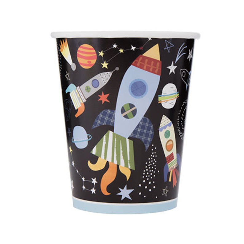 May include: A set of paper cups with a black background and a colorful space-themed design. The cups feature rockets, planets, and stars.