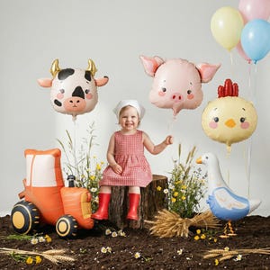 Farmyard friend balloons with a large standing tractor, magical barnyard birthday party