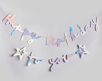 May include: A holographic iridescent banner with the words "Happy Birthday to you" and two stars.