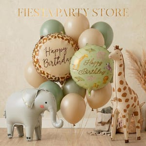 May include: A party scene with balloons, an elephant, and a giraffe. The balloons are in green, beige, and gold. Two balloons have "Happy Birthday" text. The elephant is grey with pink cheeks. The giraffe is beige with brown spots.