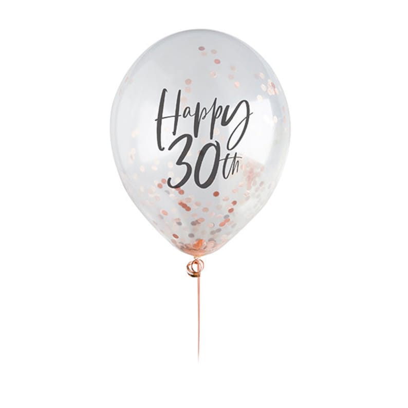 Puede incluir: Globo transparente con confeti oro rosa y la frase "Happy 30th" en negro. El globo est&aacute; sujeto a un tallo de oro rosa, ideal para una celebraci&oacute;n de cumplea&ntilde;os.