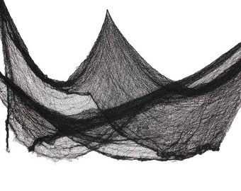 May include: Black, draped fabric with a distressed, web-like appearance. The material is loosely woven, creating a textured effect. This decorative fabric is suitable for Halloween or themed events.