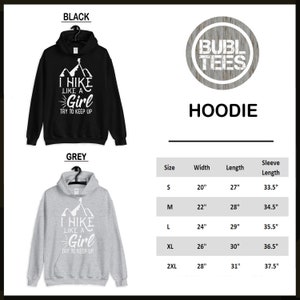 May include: A black and grey hoodie with the text "I hike like a girl try to keep up" and a mountain graphic. The hoodie is available in sizes S-2XL with measurements for width, length, and sleeve length in inches.