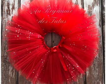 Jupe tutu rouge et paillettes. 3 couches de tulle, ceinture réglable.