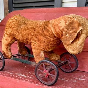 antique steiff stuffed animal dog on wheels