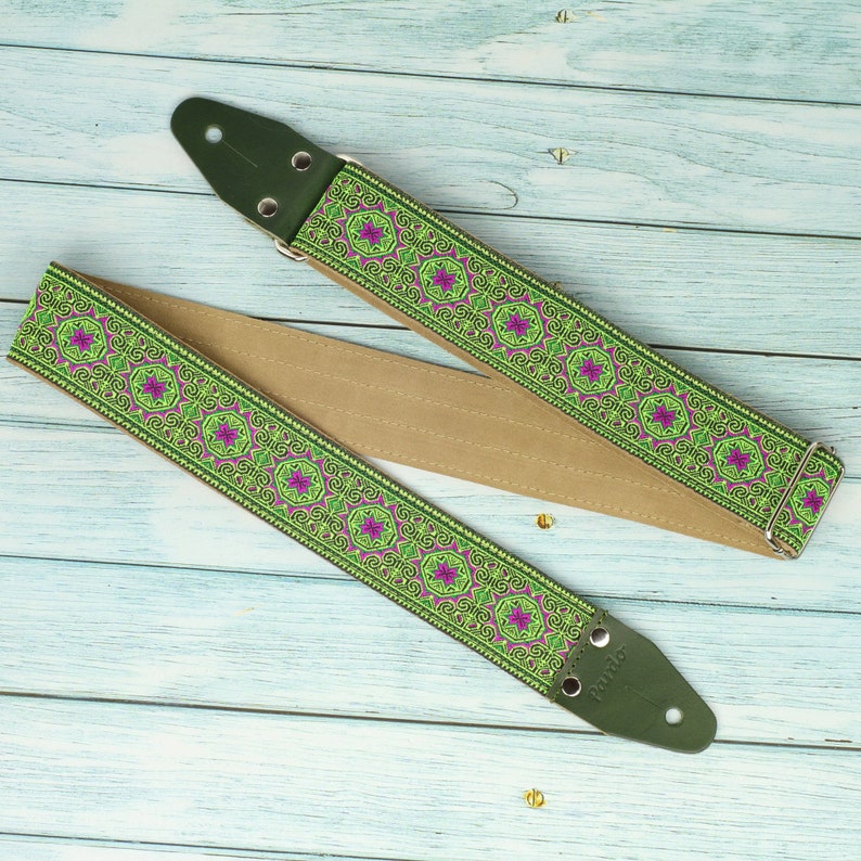 Green guitar strap woven