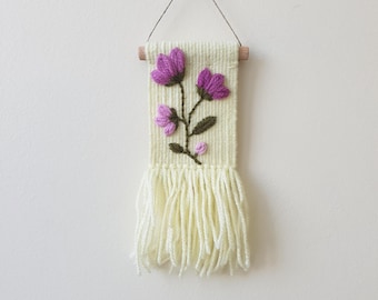 Mini woven wall hanging with with embroidered flowers. Small tapestry ornament . Gallery wall decoration. Flower embroidery art.
