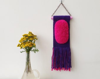 Mini woven wall hanging. Purple and fuchsia tiny handwoven decor. Very small, narrow vertical wall tapestry. Yarn wall art for small spaces.