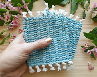 Set of two ocean blue handwoven coasters made of hand-dyed cotton cord. Mug coasters for table decoration. Nautical decor for dinning room.