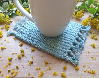 Blue hand woven coaster made of hand-dyed cotton cord. Mug coaster for table decoration. Boho decor for kitchen, dinning room, on the desk.