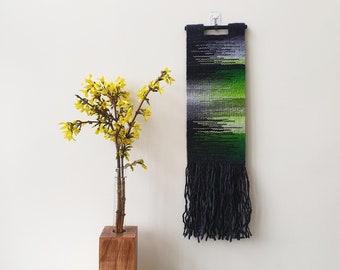 Small green black and gray woven wall hanging. Narrow, vertical handwoven decoration. Small space boho wall decor for living room, hallway