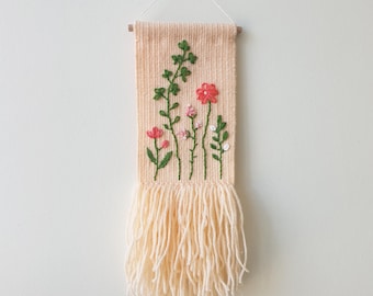 Small woven wall hanging with embroidered meadow flowers. Small tapestry ornament. Gallery wall decoration. Meadow inspired wall art.