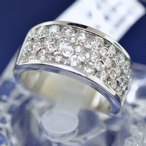 14 White Gold And Diamond Ring. Size 7