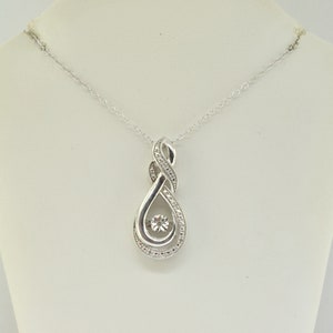 Silver Pendant With Diamonds
