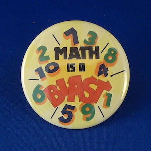 May include: A yellow button with the text "Math is a Blast" and numbers 2, 3, 4, 5, 6, 7, 8, 9, 10 around the text.