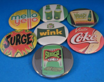 Lot of 7 RETIRED (Dead) SODAS  BUTTONS  pins pinbacks punk badges  beverage 1960'S sugar liquid drink pop Wink Veep Surge Fresca Mello Yello
