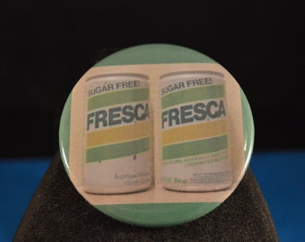 FRESCA Retired (Dead) SODAS citrus Button 2 Cans pin pinback punk badge beverage 1960'S sugar pop Wink Veep Surge Mello Yello liquid