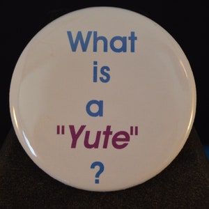 May include: White button with blue text that reads "What is a "Yute"?"