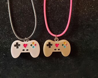 VIDEO GAME CONTROLLERS Set of 2 Charms Pendant Necklaces Lavender charm on black rope necklace; peach charm on hot pink necklace. Free ship!