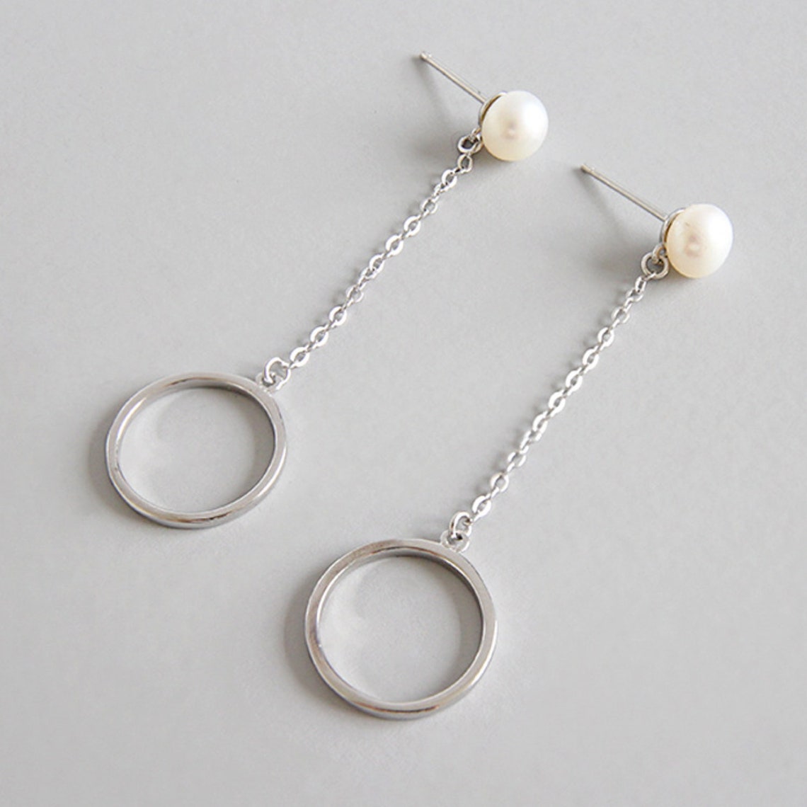 silver circle drop earrings