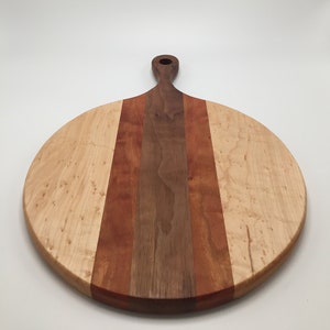 Handmade round birdseye maple, walnut, and cherry cutting board with handle, cheeseboard, serving board, charcuterie board