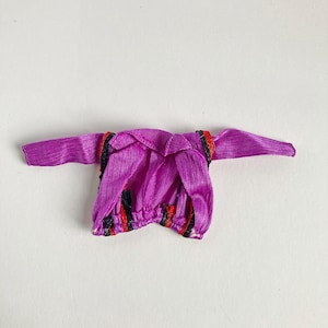 Vintage rullskridskoåkningsbarbie från 1980: Lila jacka