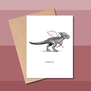 CUPIDSAURUS Dinosaure Saint-Valentin Carte drôle de Saint-Valentin Carte de voeux mignonne Saint-Valentin Dino cadeau Saint-Valentin Dinosaure Cupidon