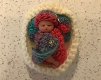 OOAK miniature baby doll with hand crocheted clothing