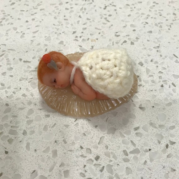 clay baby doll