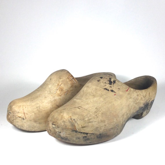 Carved wooden best sale shoes