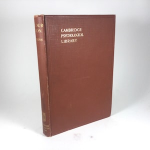 May include: A brown book with the title "Colour Vision" and the text "Cambridge Psychological Library" on the cover.