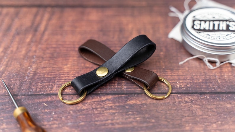 Black keyring over a dark brown keyring