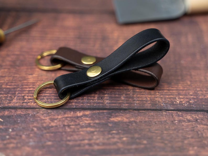 Black keyring over a dark brown keyring