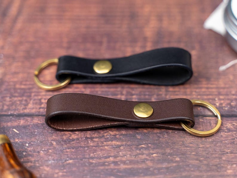 Dark brown and black keyrings side by side