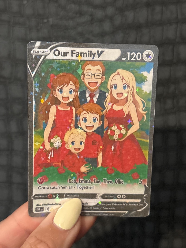 May include: A holographic trading card featuring a family illustration. The card reads "Our Family V" and includes the names Rob, Emma, Zoe, Theo, and Ollie. The family is depicted in a cartoon style, with the text "Gotta catch 'em all - Together!"
