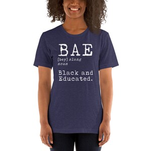 May include: A navy blue t-shirt with white text that reads "BAE [bey] slang noun Black and Educated."