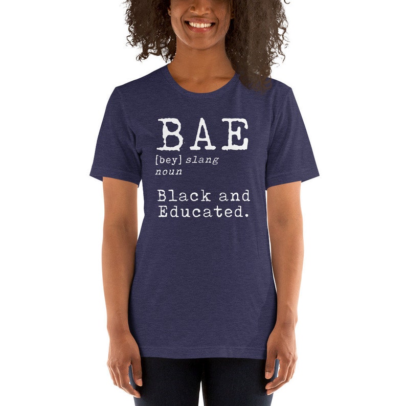 May include: A navy blue t-shirt with white text that reads "BAE [bey] slang noun Black and Educated."