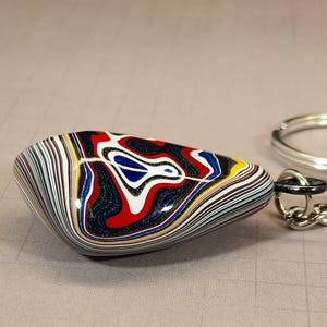 May include: A rustic wooden sign with the text "Welcome to our home" in white lettering. The sign features a distressed finish and a simple, inviting design, perfect for a front porch or entryway.